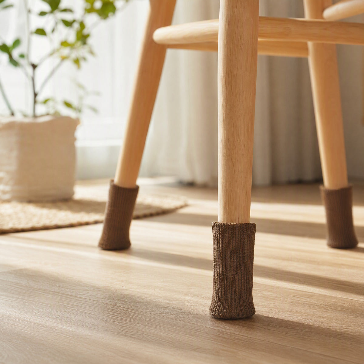 Feltgrip™ Round Chair Leg Covers With Felt And Silicone in a calm home setting