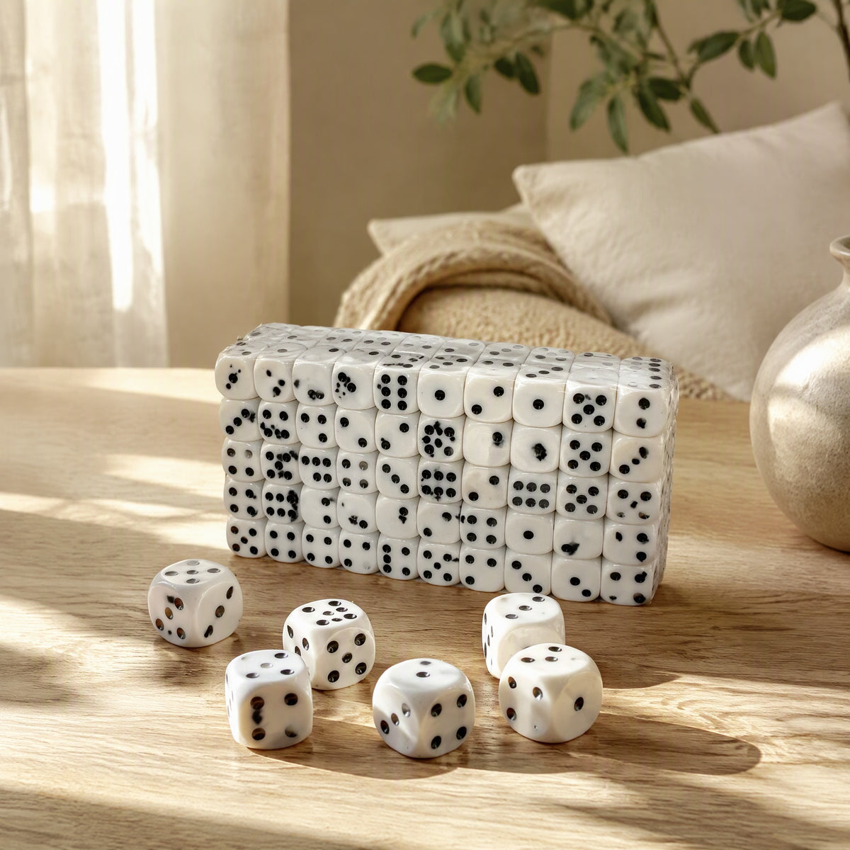 Roundroll™ White Rounded Acrylic Dice in a calm home setting