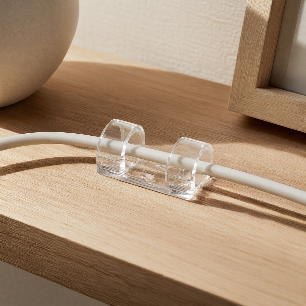 Clearloop™ Transparent Plastic Cable Organizer, styled close view