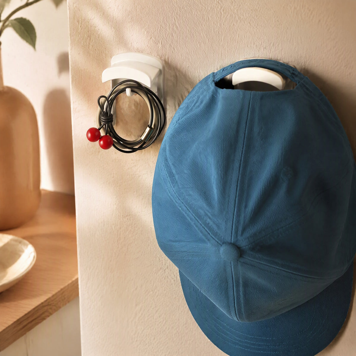 Earperch™ Adhesive Wall Mount Earphone Hook, styled close view