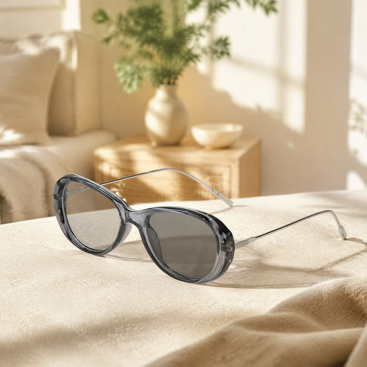 Tintveil™ Blue Light Color-Changing Glasses in a calm home setting