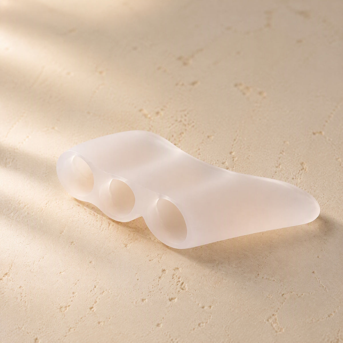 Toeglide™ Silicone Toe Separator for Overlapping Toes, material and detail close-up