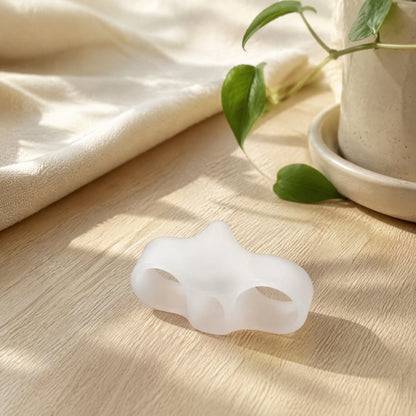 Twincove™ Silicone Double-Ring Toe Separator in a calm home setting