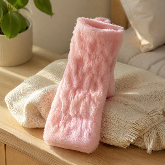 Fleecehug™ Coral Fleece Mid-Calf Socks in a calm home setting