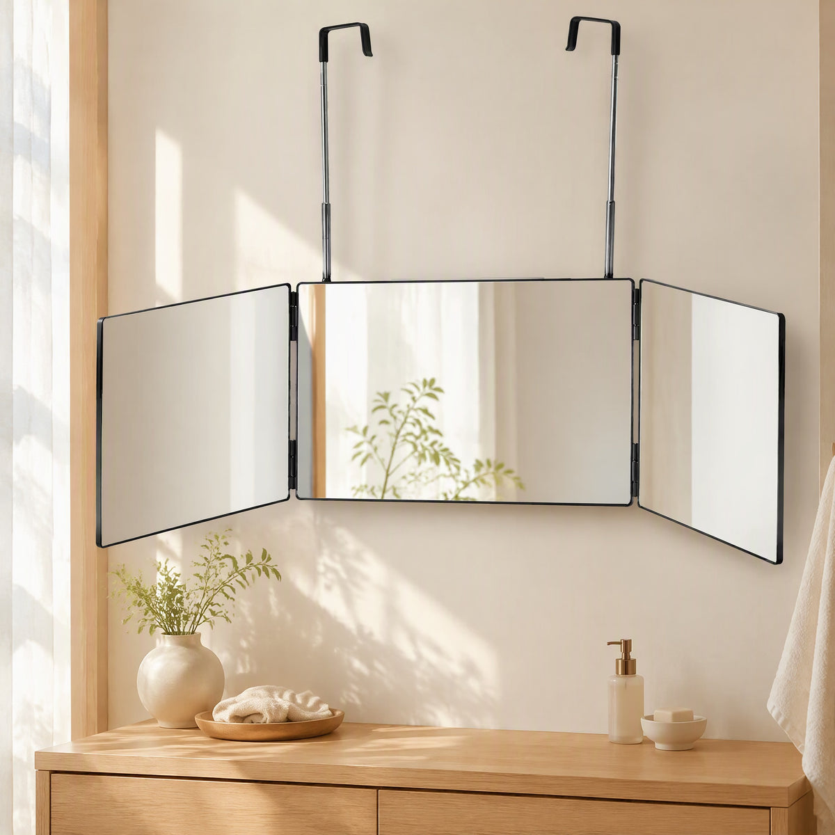 Triview™ Three-Sided Folding Hanging Mirror in a calm home setting