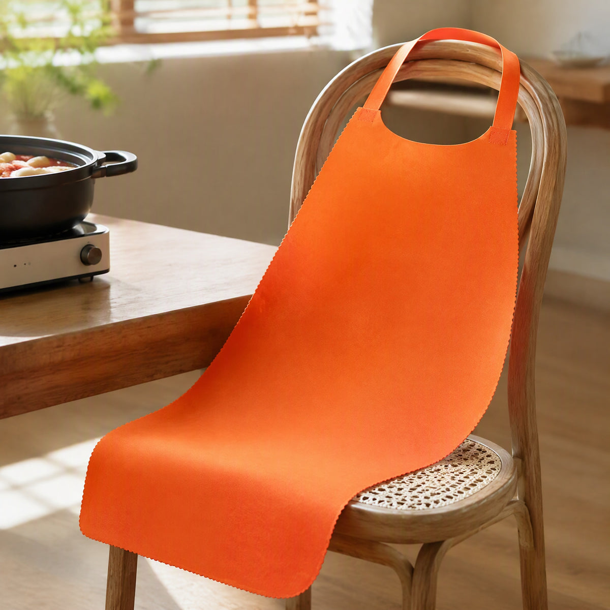 Quickbib™ Disposable Non-Woven Apron, styled close view