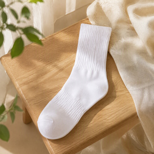 Midstride™ Mid-Calf Sports Socks in a calm home setting