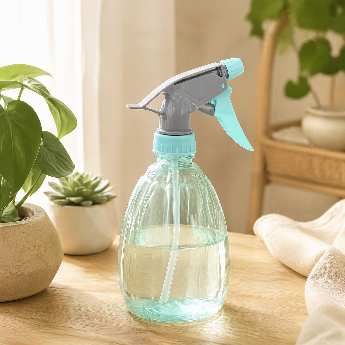 Clearpour™ Transparent 500 ml Watering Can in a calm home setting