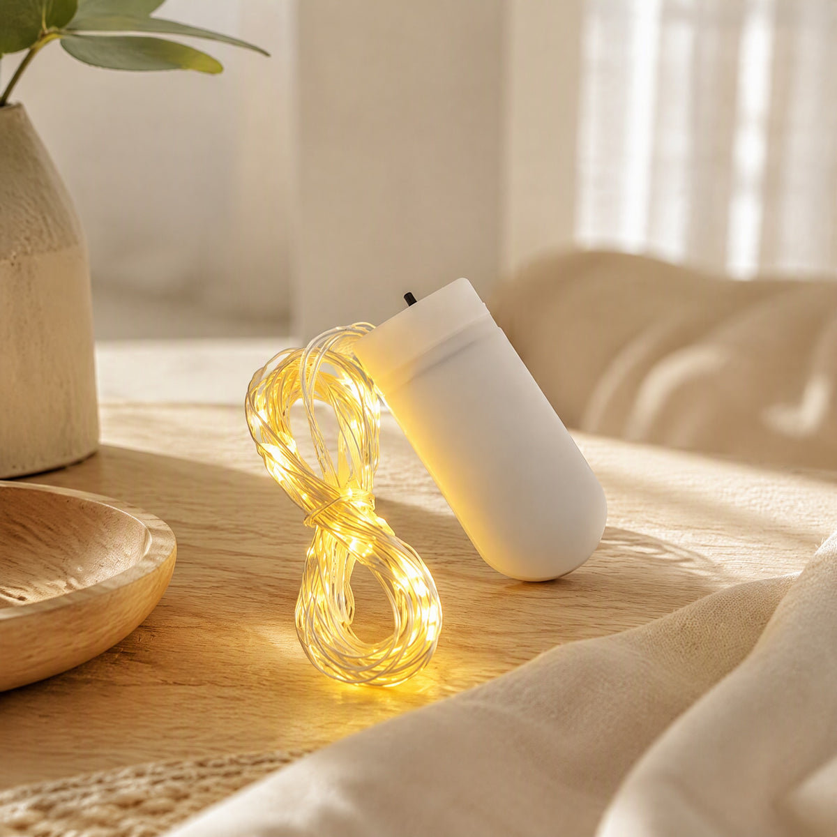 Glowstrand™ LED Copper Wire Light String in a calm home setting