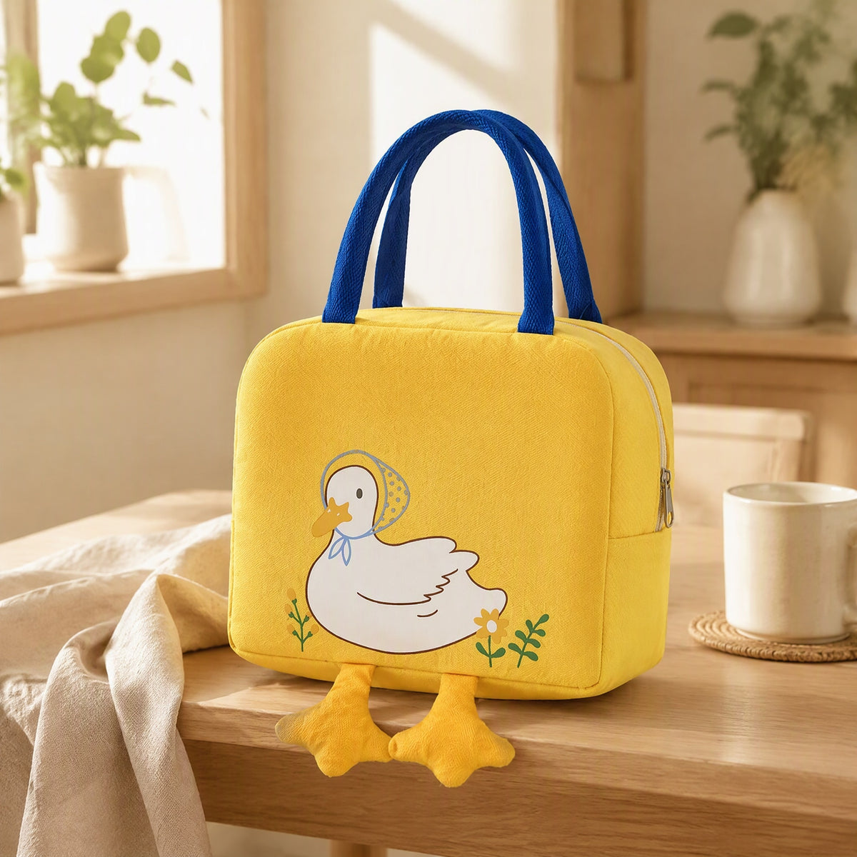 Lunchhug™ Cartoon Insulated Lunch Tote Bag in a calm home setting
