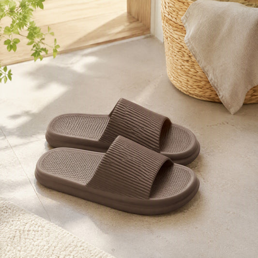 Unisole™ EVA Unisex Flip-Flop Slippers in a calm home setting
