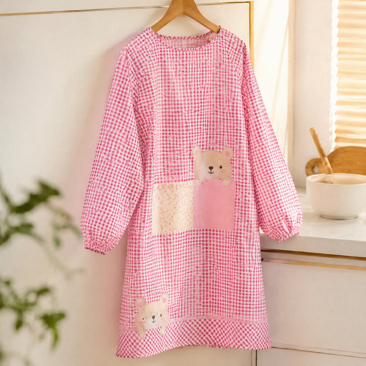 Cookcover™ Long-Sleeved Cartoon Kitchen Apron, styled close view