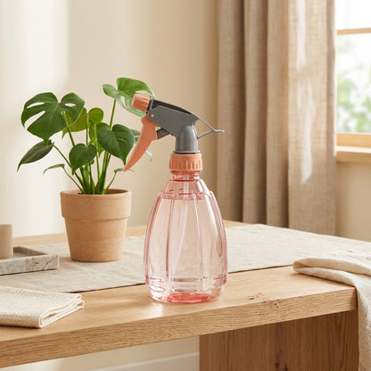 Sprayleaf™ Plastic Plant Watering Spray Can in a calm home setting
