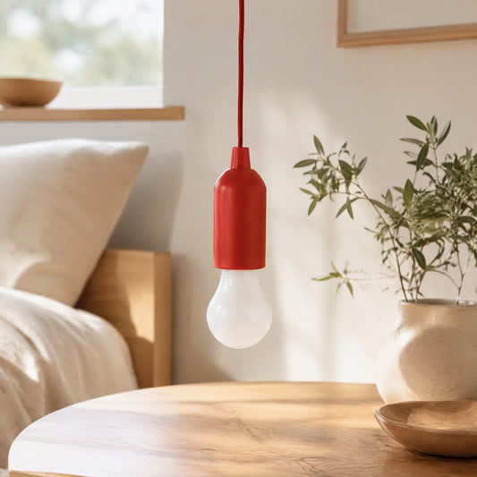Drawglow™ Battery-Powered LED Drawstring Lamp in a calm home setting