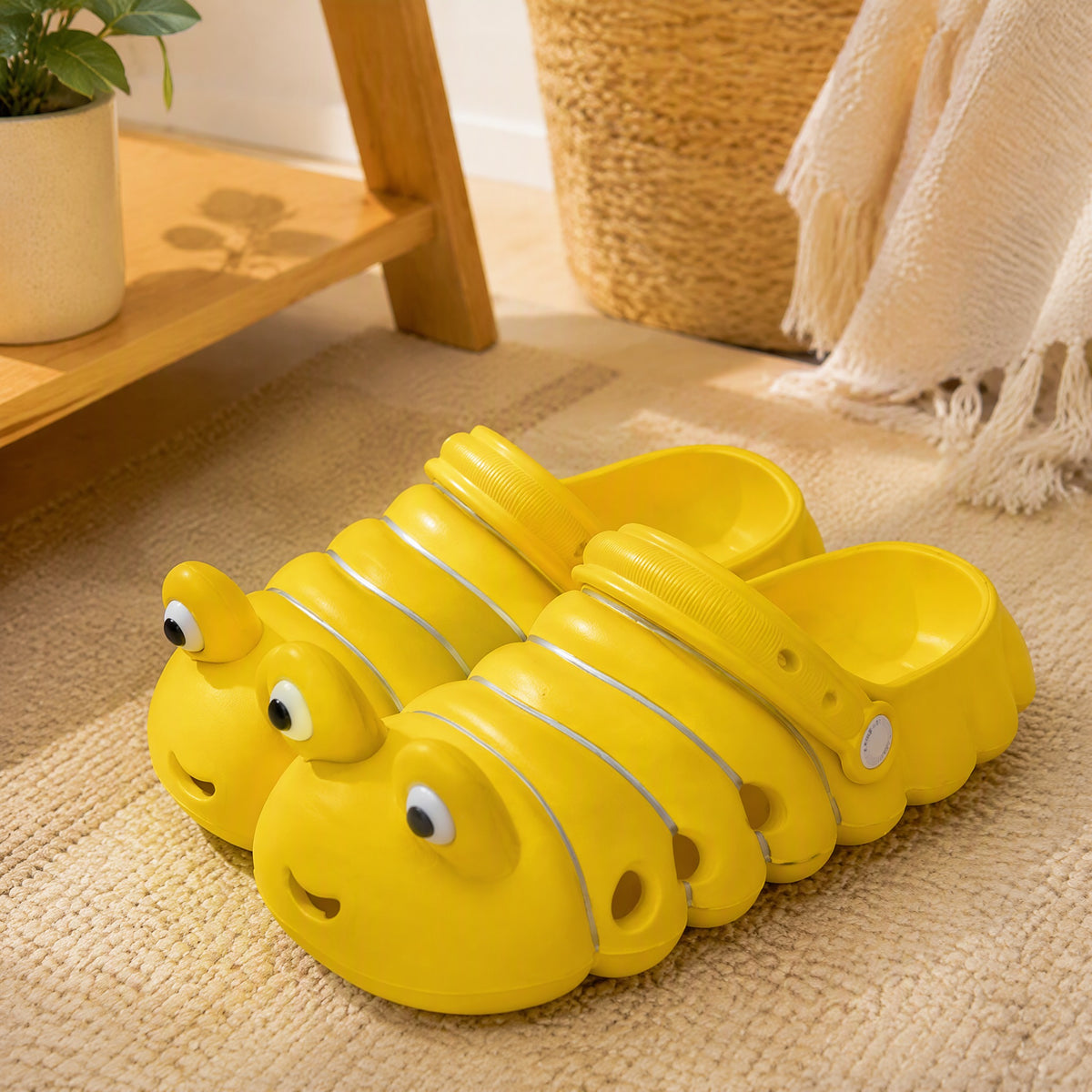 Crawlclog™ Cartoon Caterpillar Clogs in a calm home setting