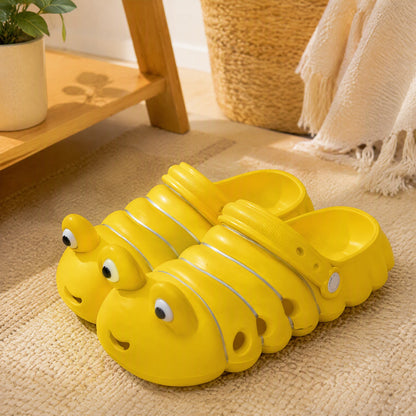 Crawlclog™ Cartoon Caterpillar Clogs in a calm home setting