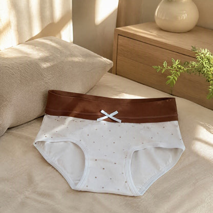 Pureweft™ Pure Cotton Mid-Waist Briefs in a calm home setting