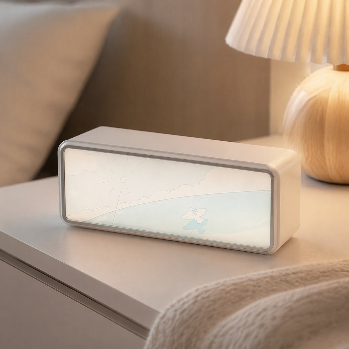 Glowhush™ White Noise Night Light Speaker, styled close view