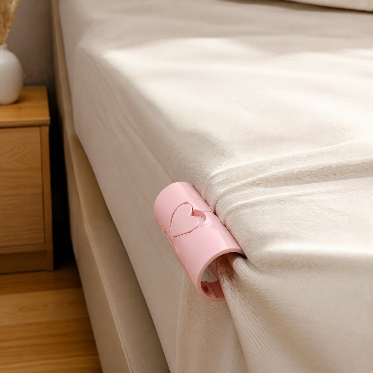 Bedtether™ Plastic Bed Sheet Clips, Adjustable 6-Pack, styled close view