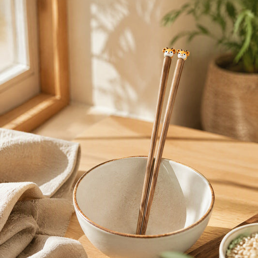 Twigpinch™ Wooden Cartoon Training Chopsticks in a calm home setting