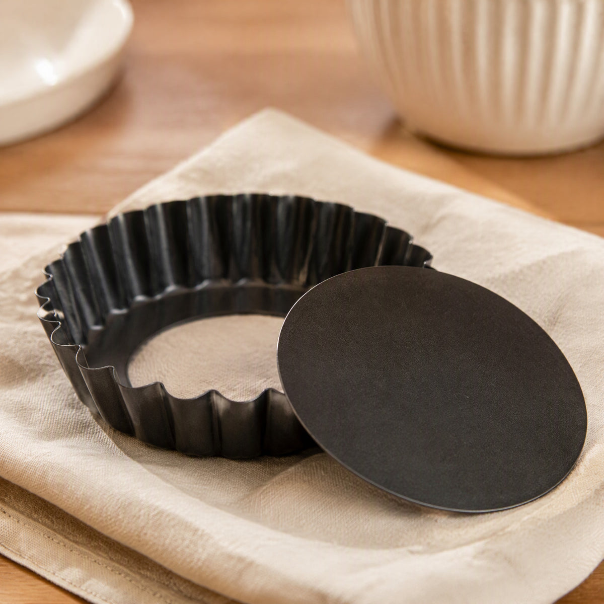 Roundbake™ Round Carbon Steel Cake Mold, styled close view