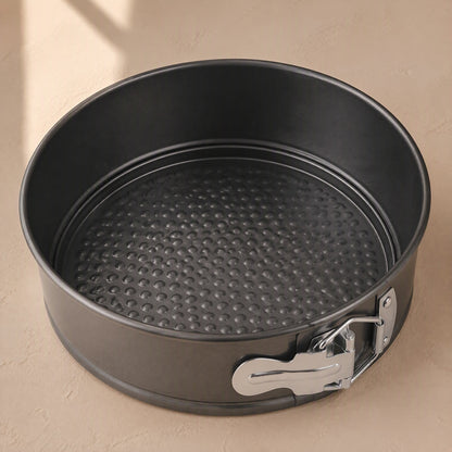 Moldsmith™ Carbon Steel Cake Mold, material and detail close-up