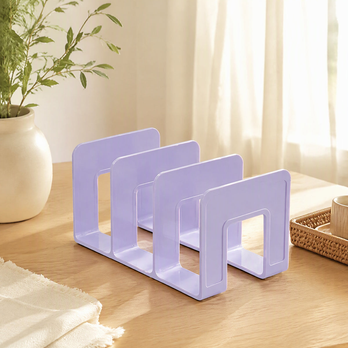 Pageprop™ Desktop Plastic Book Stand in a calm home setting