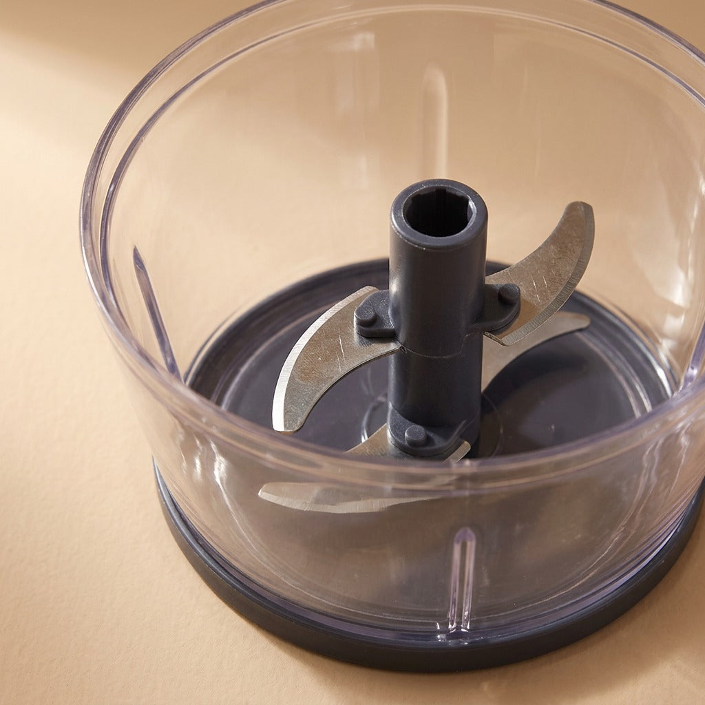 Clovepulp™ Manual Plastic Garlic Crusher, material and detail close-up