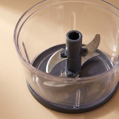 Clovepulp™ Manual Plastic Garlic Crusher, material and detail close-up