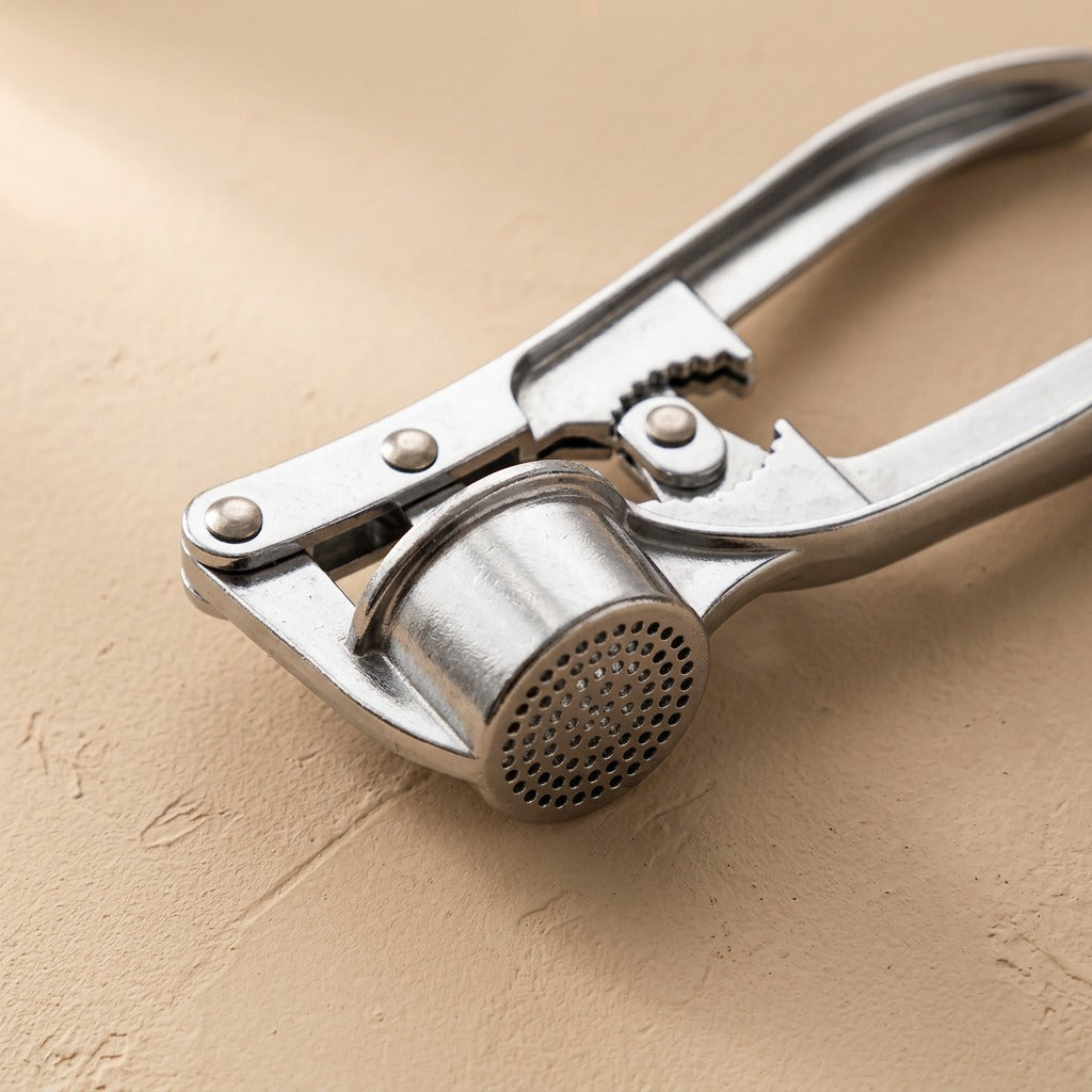 Mashclove™ Zinc Alloy Garlic Press, material and detail close-up