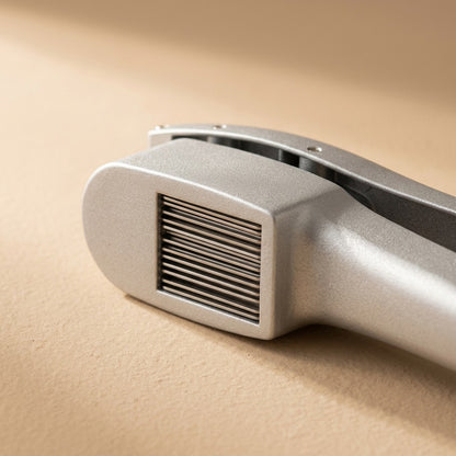 Squeezebulb™ Aluminum Alloy Garlic Press, material and detail close-up