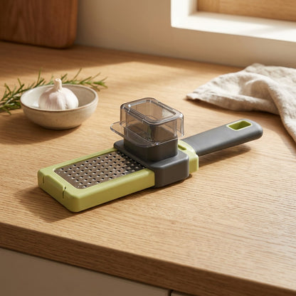 Cloveease™ Green Plastic Manual Garlic Press, styled close view