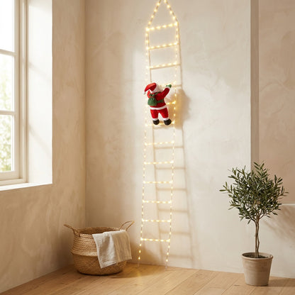Clausglow™ Santa Claus Christmas Ladder Lights in a calm home setting