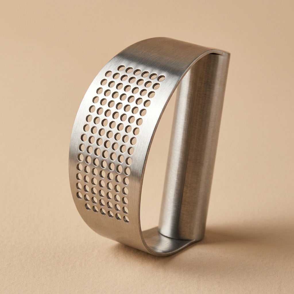 Clovepush™ 430 Stainless Steel Garlic Press, material and detail close-up