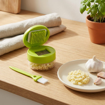 Minimash™ Mini ABS Plastic Garlic Press in a calm home setting