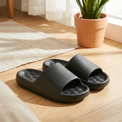 Foamglide™ EVA Foam Slide Sandals in a calm home setting