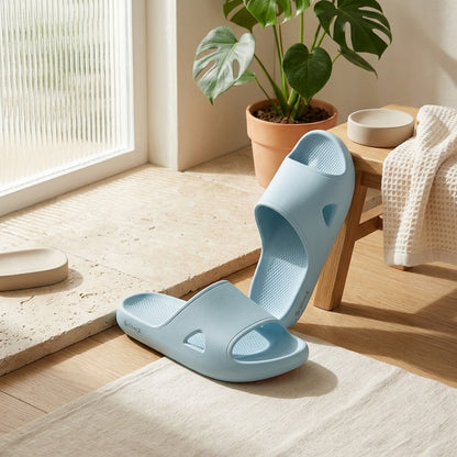 Gripglide™ EVA Foam Non-Slip Slide Slippers in a calm home setting