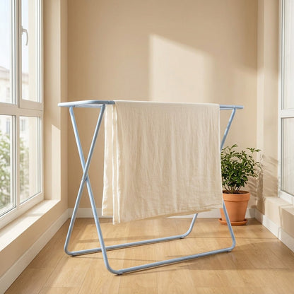 Sheetdry™ Clothes Drying Rack for Bed Sheets in a calm home setting