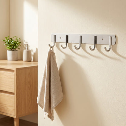 Stickhold™ Stainless Steel Adhesive Wall Hook in a calm home setting