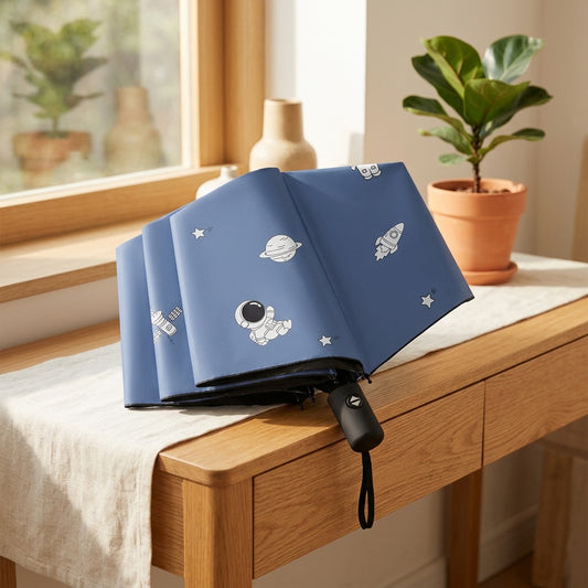 Orbitfold™ Three-Fold Astronaut Umbrella in a calm home setting