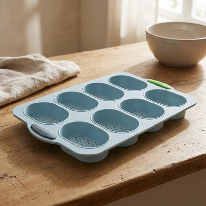 Loafcast™ Three-Slot Baguette and Eight-Hole Silicone Cake Mold, styled close view