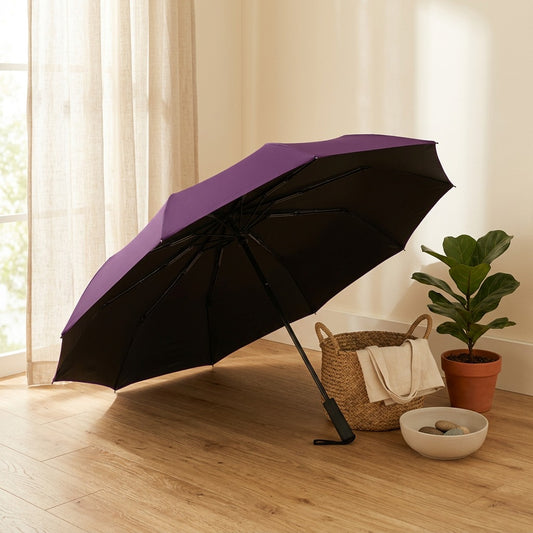 Sunrib™ 12-Bone Folding Sun Umbrella in a calm home setting