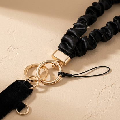 Satinkeeper™ Elastic Satin Phone Lanyard, material and detail close-up