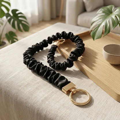 Satinkeeper™ Elastic Satin Phone Lanyard in a calm home setting