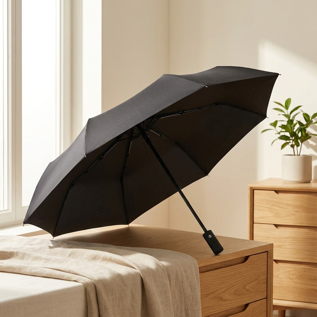 Rainshade™ Black Rubber Advertising Umbrella in a calm home setting