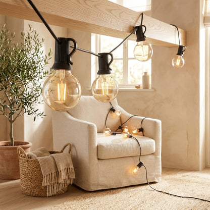Gleamstrand™ G40 Warm White String Lights in a calm home setting