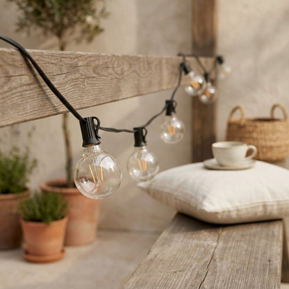 Gleamstrand™ G40 Warm White String Lights, styled close view
