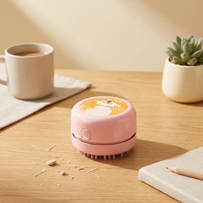 Crumbwhisk™ Mini Desktop Vacuum Cleaner in a calm home setting
