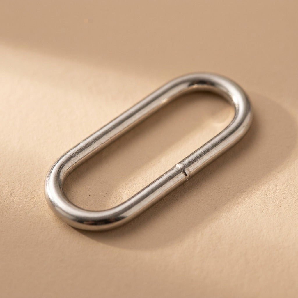 Eggclasp™ Metal Egg-Shaped Bag Buckle, material and detail close-up