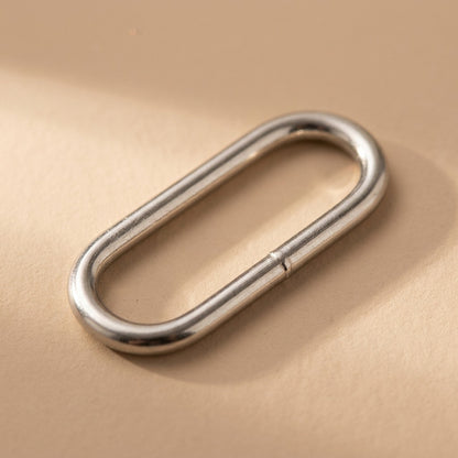 Eggclasp™ Metal Egg-Shaped Bag Buckle, material and detail close-up